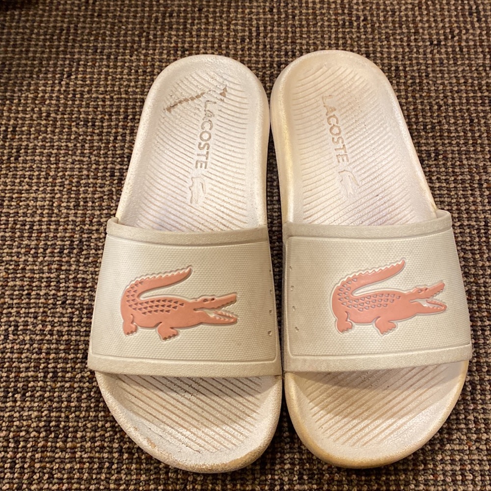 Lacoste white slides with pink alligator logo